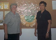 Picture of two volunteers working at Summer Camp